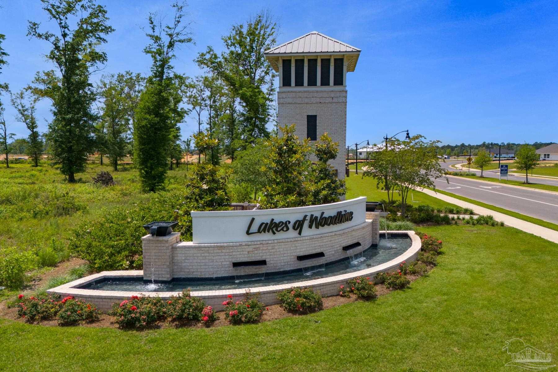 4631 Eider Road Pace, FL 32571 - Photo 5 of 46 a view of a house with a yard