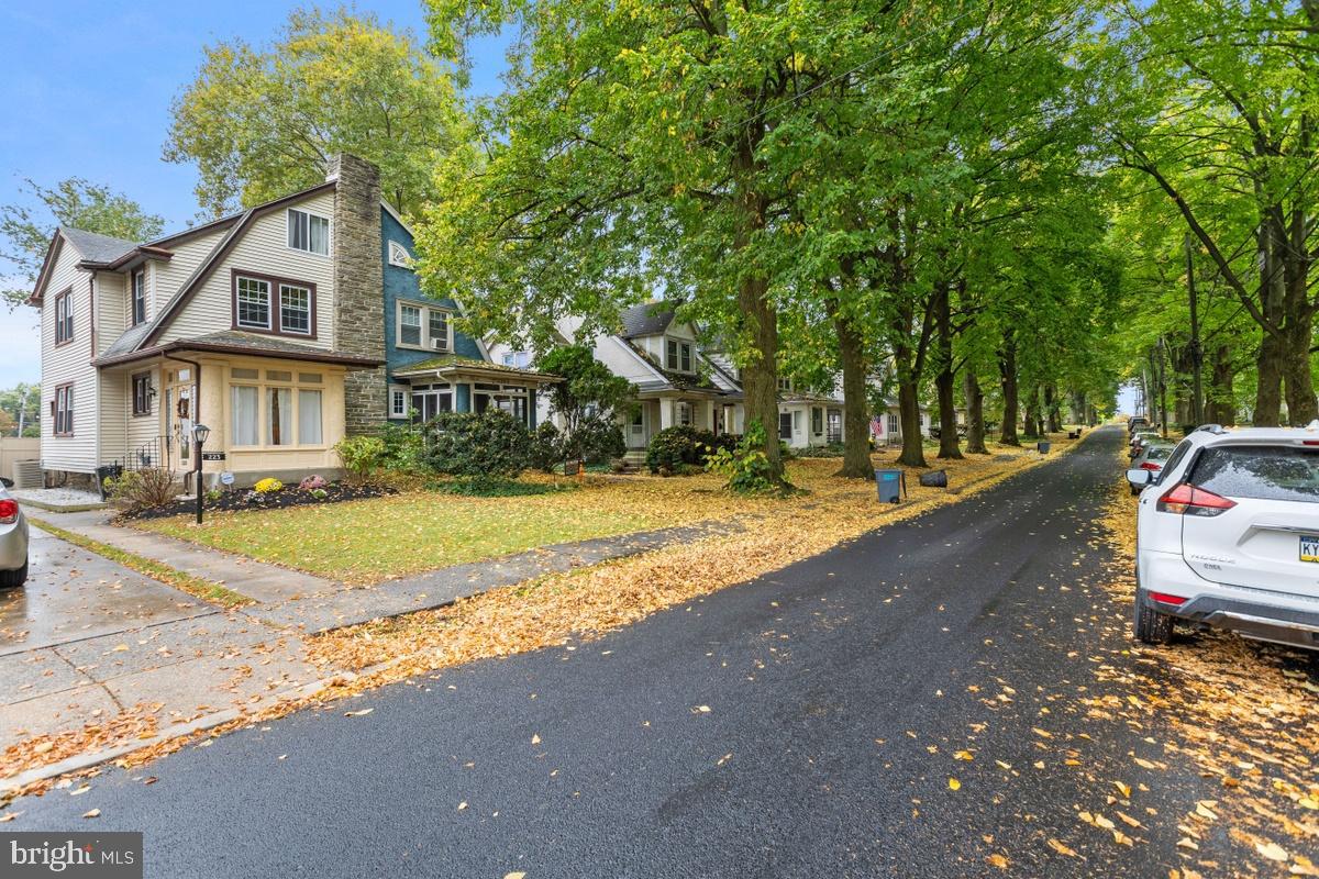 223 Ballymore Road Springfield, PA 19064 - Photo 2 of 29 One-way tree-lined street.