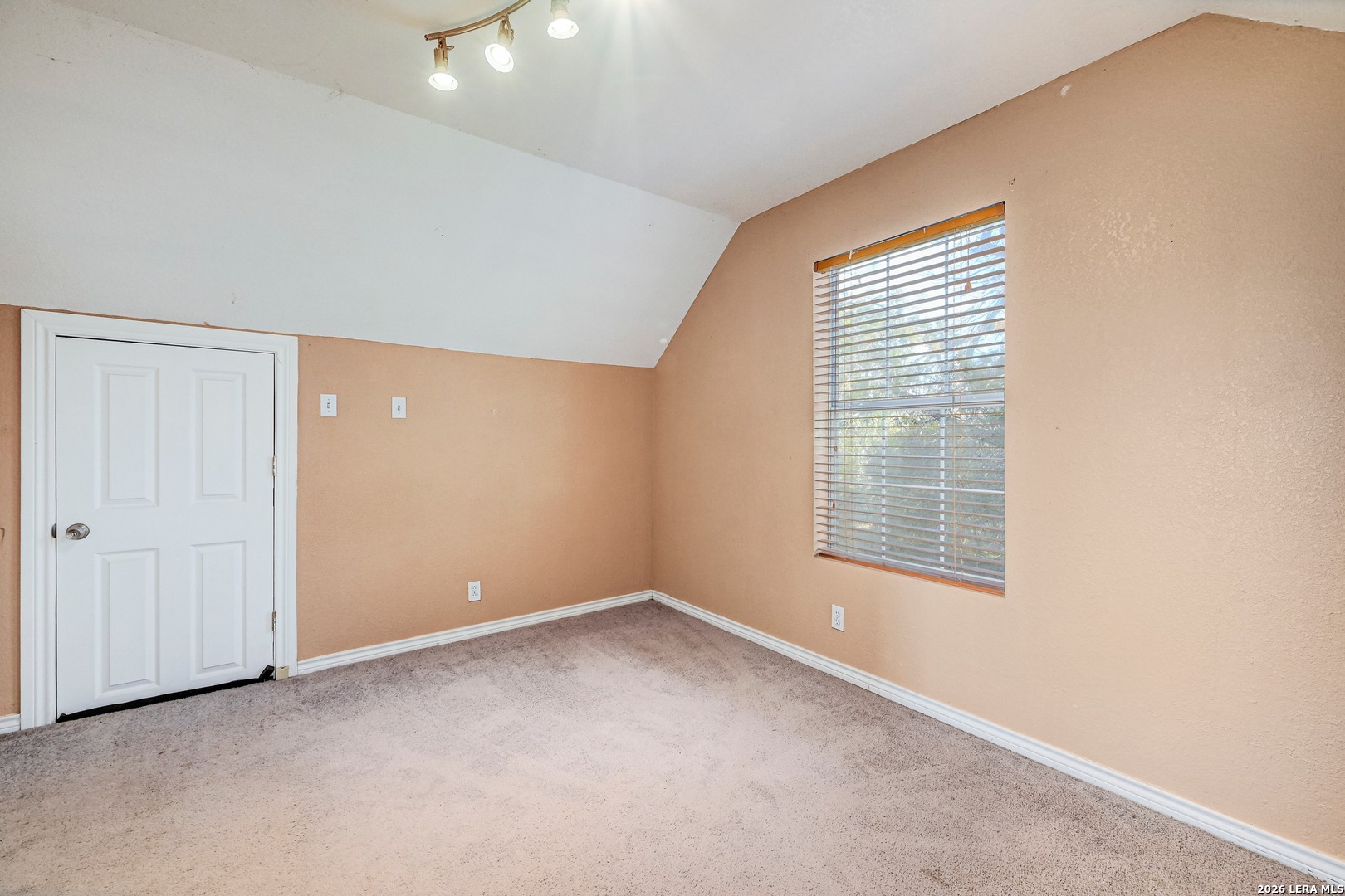 1125 Highpoint Lane Spring Branch, TX 78070 - Photo 16 of 25 an empty room with a window