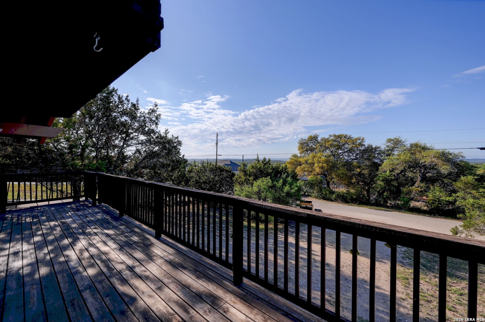 1125 Highpoint Lane Spring Branch, TX 78070 - Photo 21 of 25 a view of balcony with wooden floor