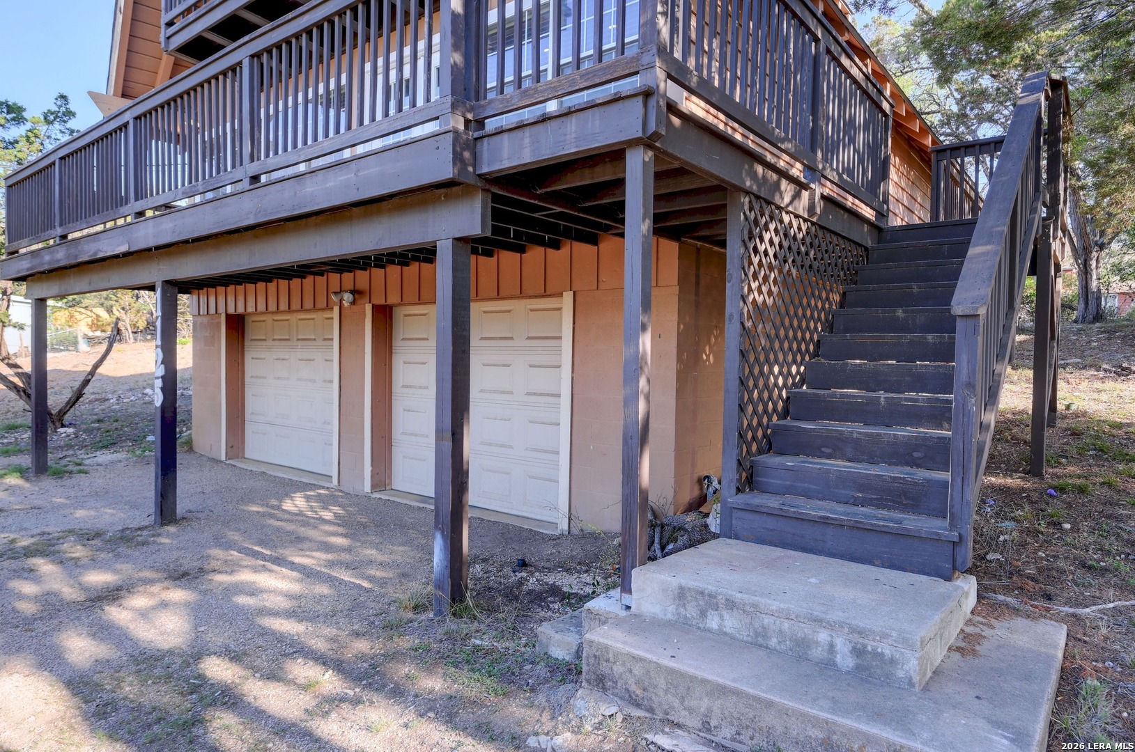 1125 Highpoint Lane Spring Branch, TX 78070 - Photo 22 of 25 a view of entryway with wooden stairs