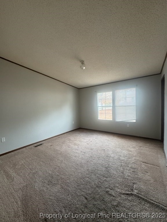142 Oak Street Fayetteville, NC 28306 - Photo 3 of 6 an empty room with a window and fireplace