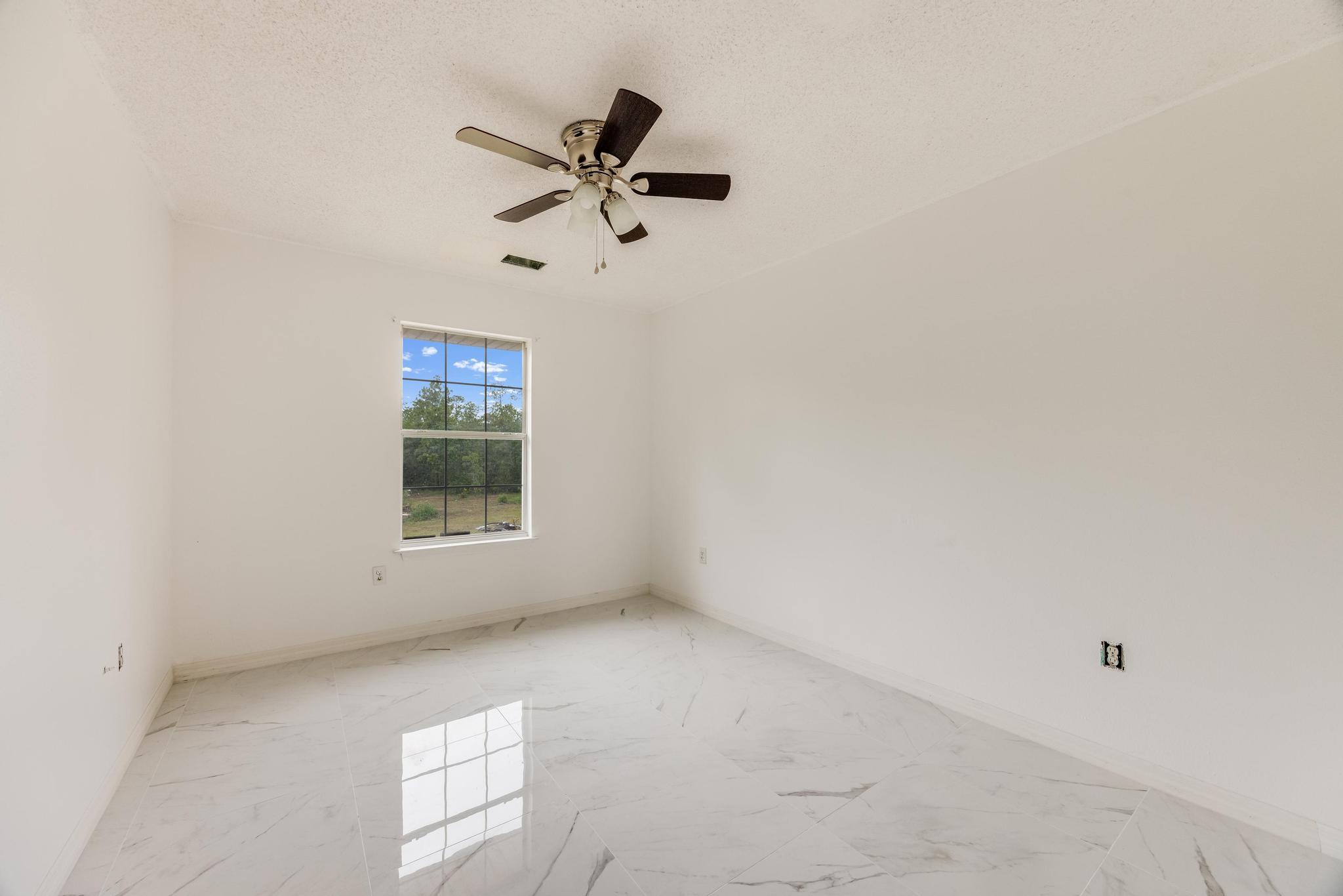 4140 Big Buck Trail Crestview, FL 32539 - Photo 26 of 40 an empty room with a window