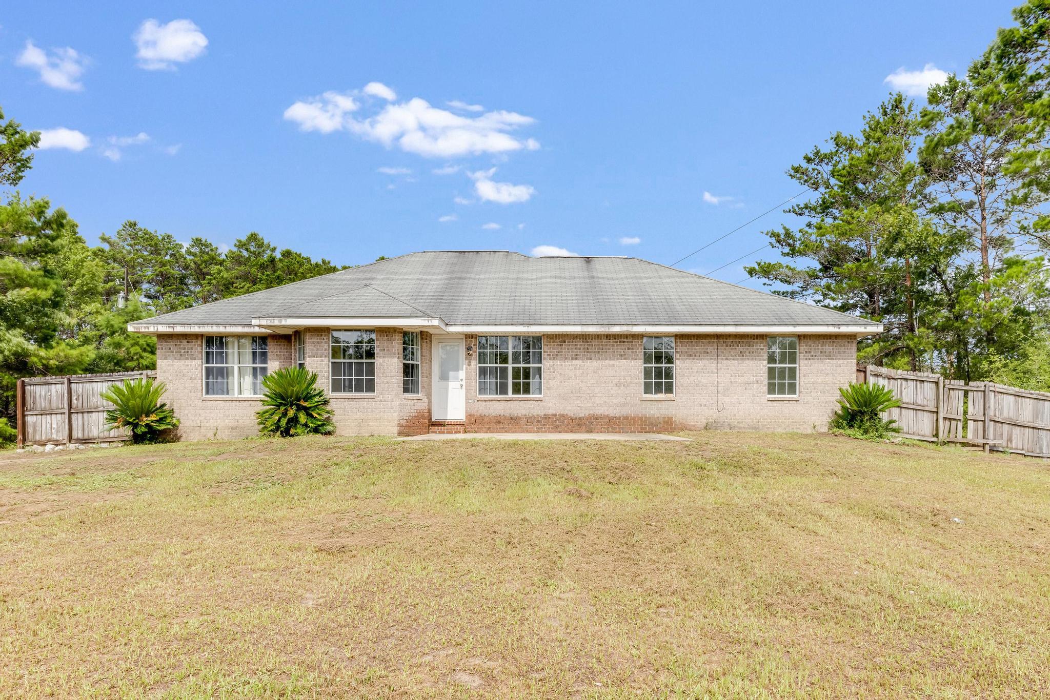 4140 Big Buck Trail Crestview, FL 32539 - Photo 33 of 40 a view of a house with a patio
