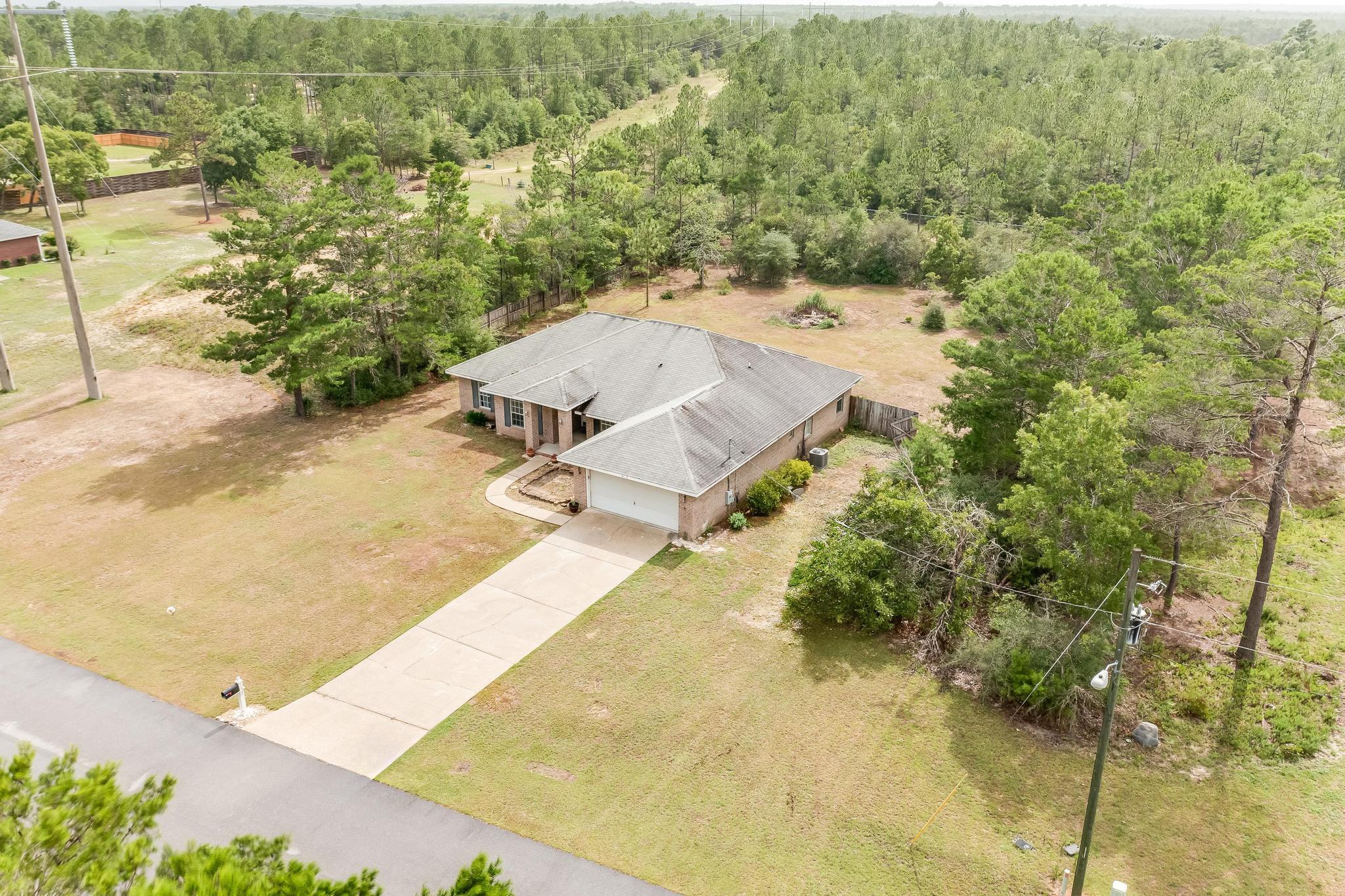 4140 Big Buck Trail Crestview, FL 32539 - Photo 36 of 40 view of a lake with a mountain