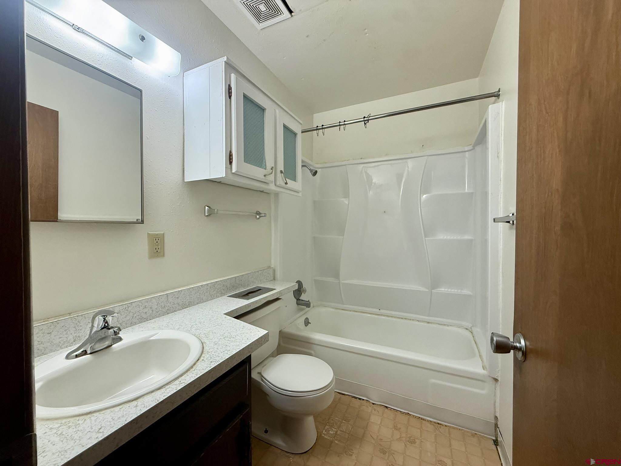 34237 Highway 550, Unit 27 Durango, CO 81301 - Photo 23 of 45 a bathroom with a sink a toilet and shower
