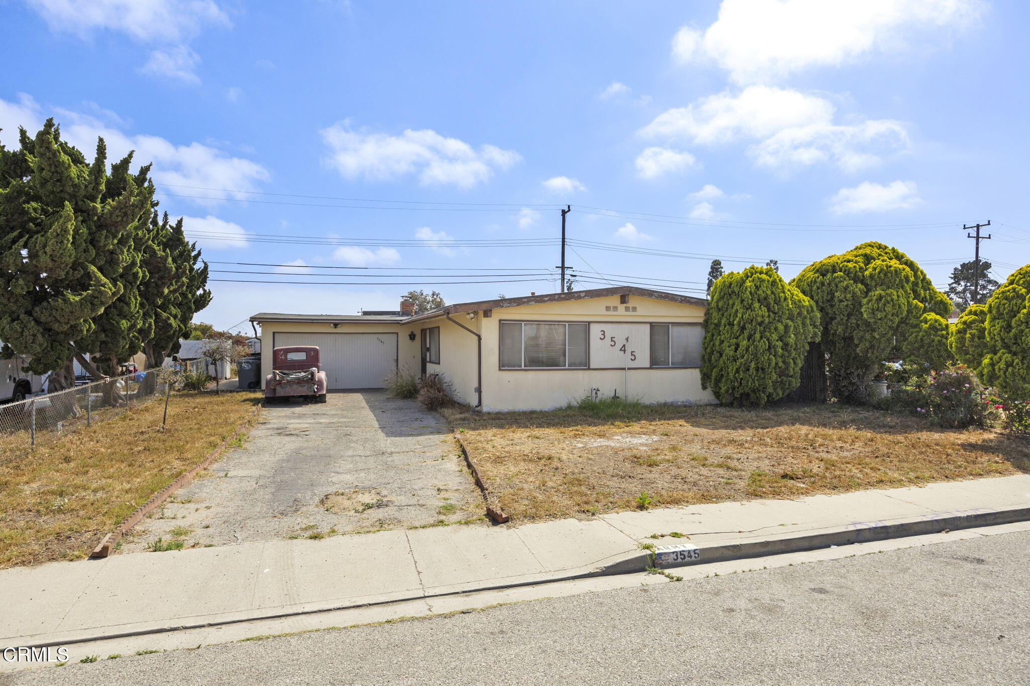 3545 Sutter Drive Oxnard, CA 93033 - Photo 3 of 12 a view of a house with a yard