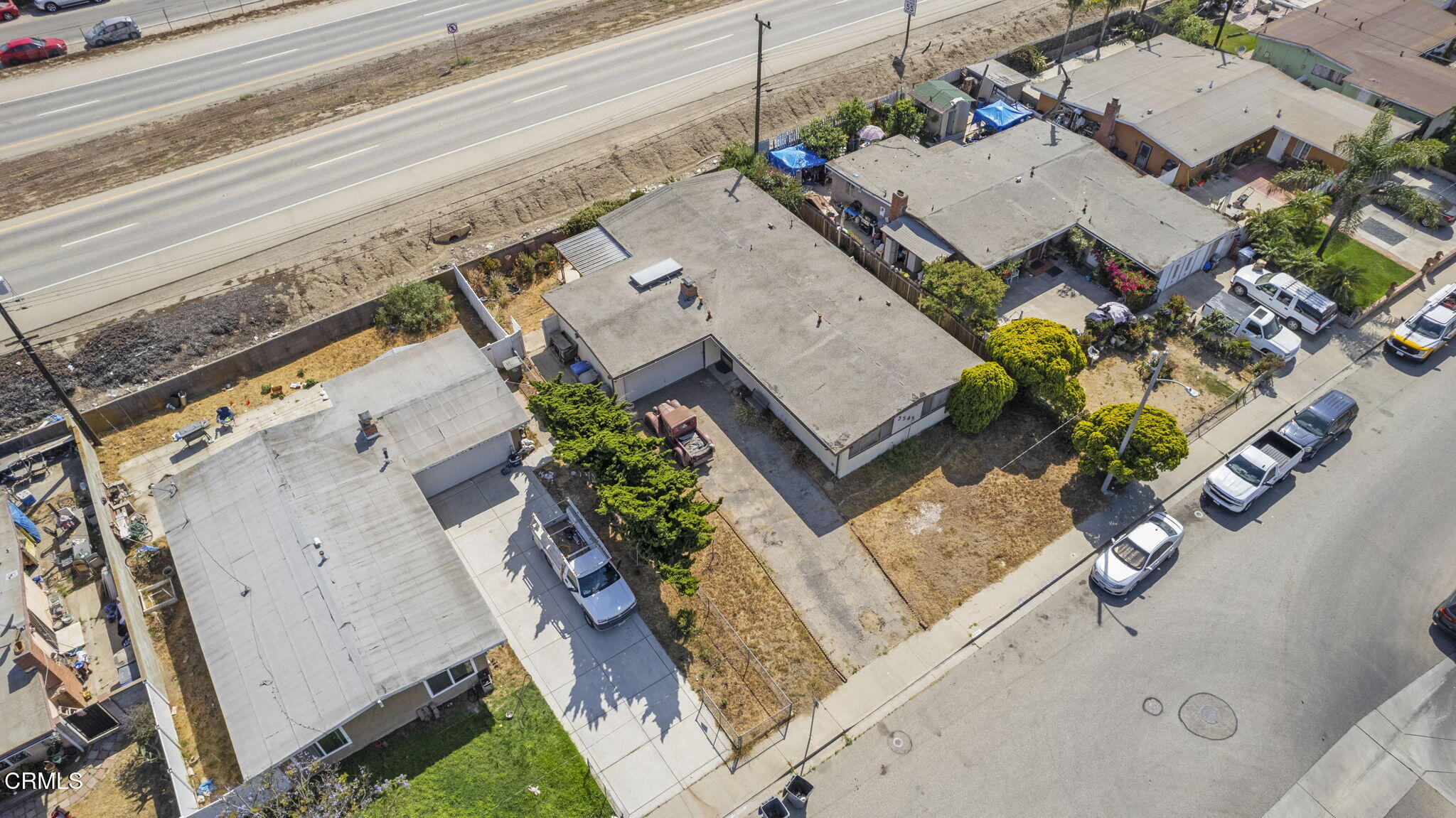 3545 Sutter Drive Oxnard, CA 93033 - Photo 8 of 12 an aerial view of a house with a yard