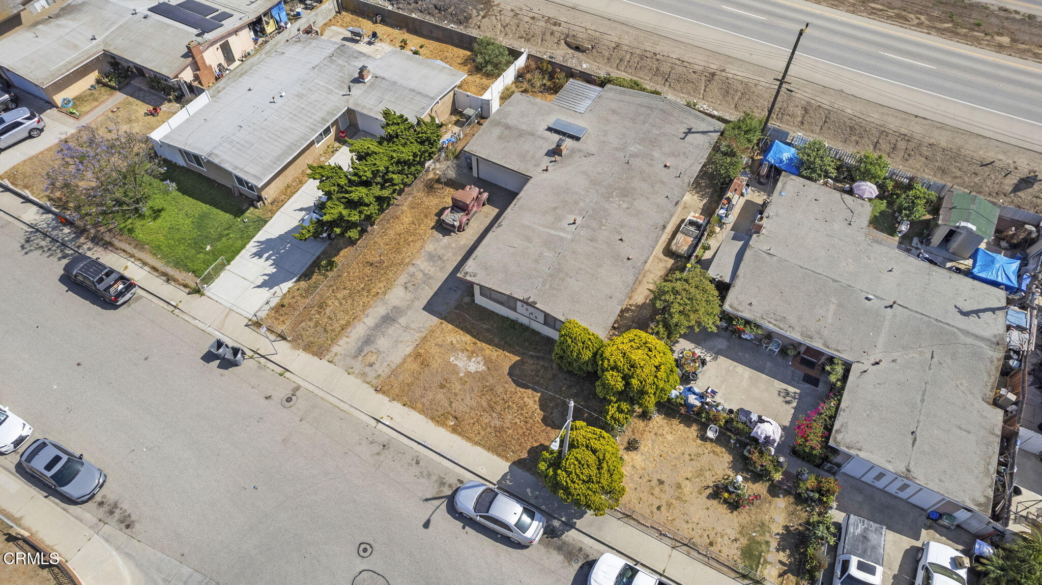 3545 Sutter Drive Oxnard, CA 93033 - Photo 10 of 12 an aerial view of a house with a swimming pool