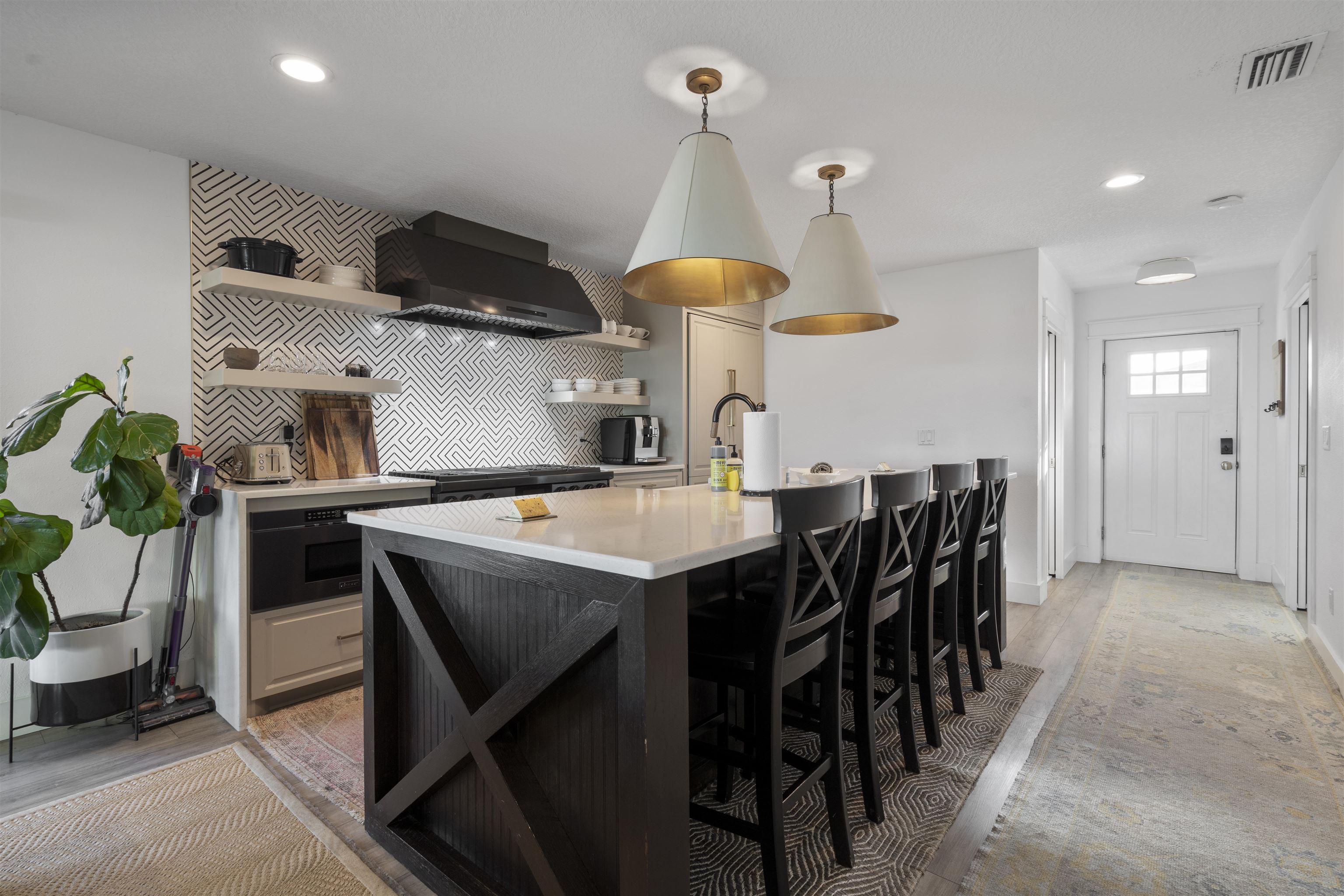 5730 Rudolph Avenue St. Augustine, FL 32080 - Photo 12 of 72 a kitchen with a table and chairs in it