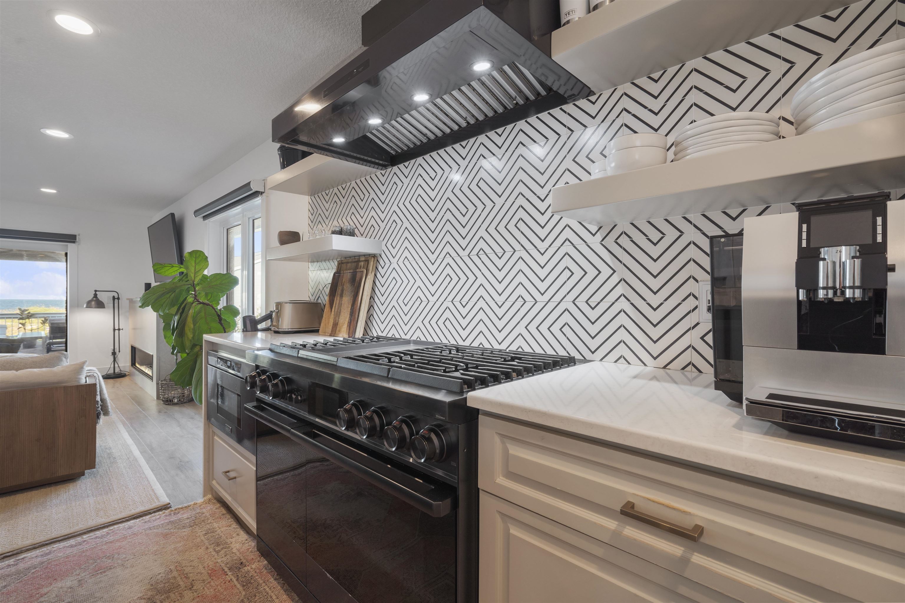 5730 Rudolph Avenue St. Augustine, FL 32080 - Photo 14 of 72 a kitchen with stainless steel appliances granite countertop a stove and a sink