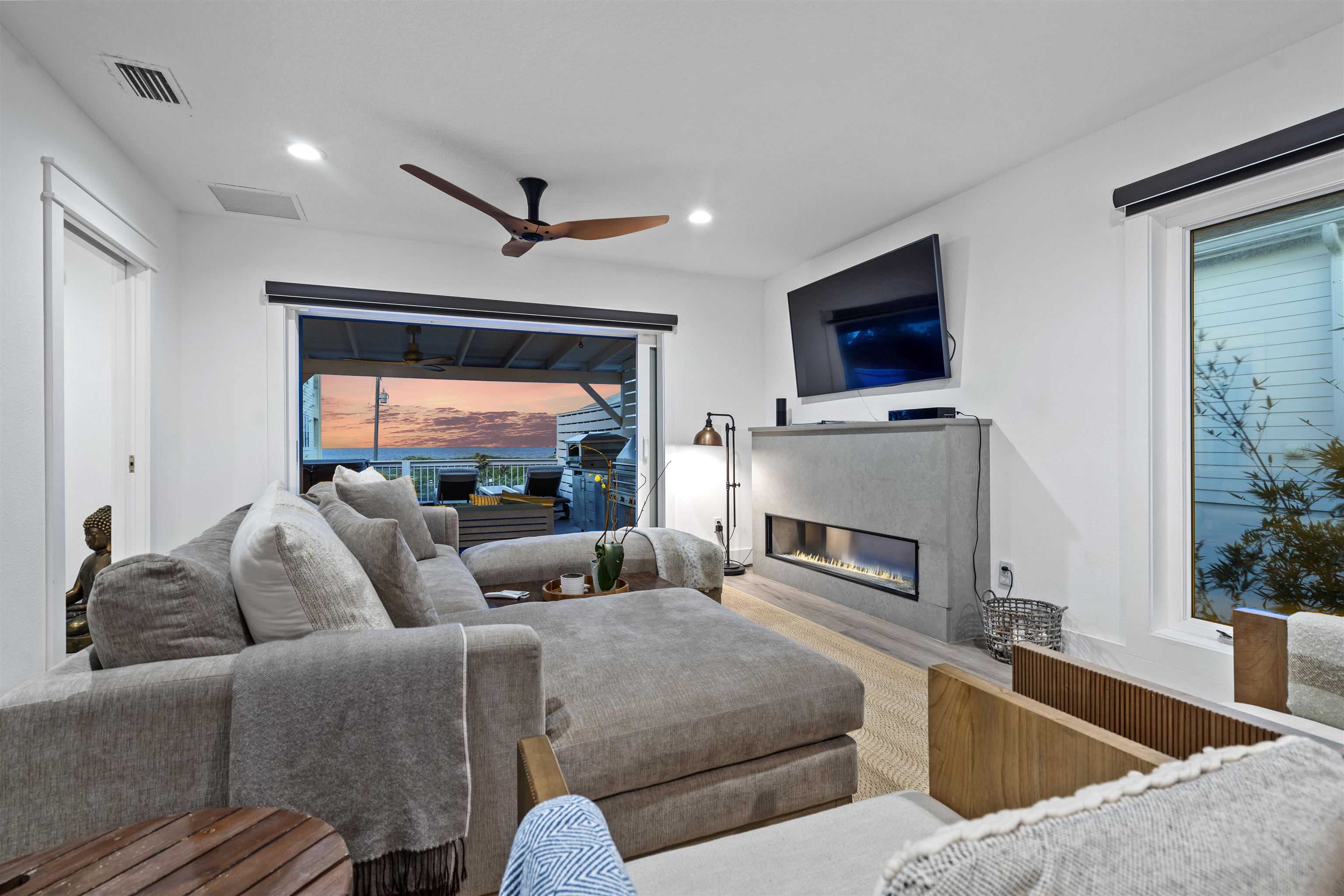 5730 Rudolph Avenue St. Augustine, FL 32080 - Photo 16 of 72 a living room with furniture and a fireplace