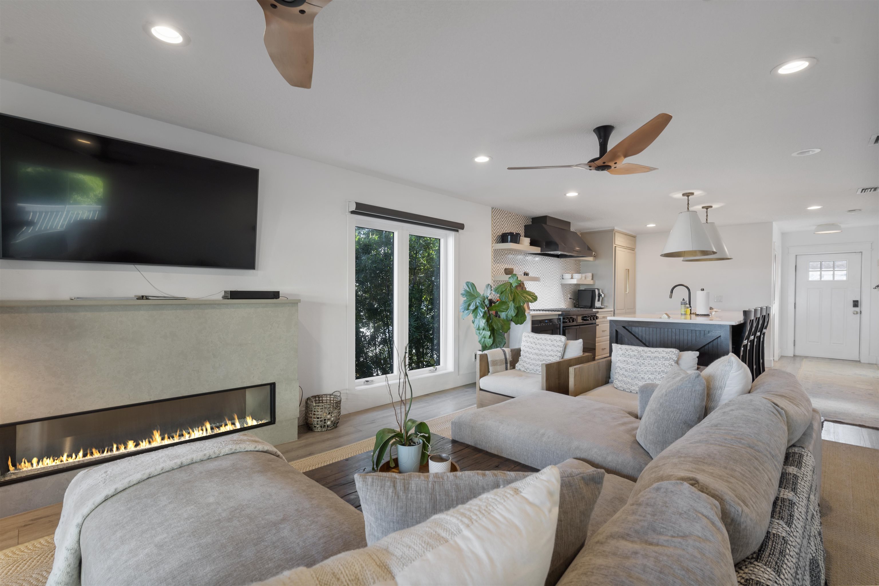 5730 Rudolph Avenue St. Augustine, FL 32080 - Photo 17 of 72 a living room with furniture and a flat screen tv