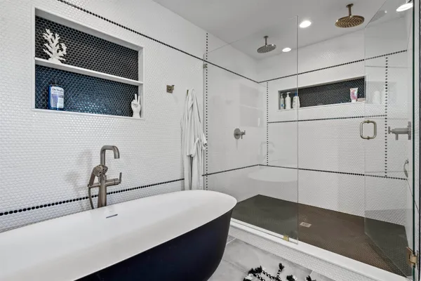 a backyard of a house with outdoor seating