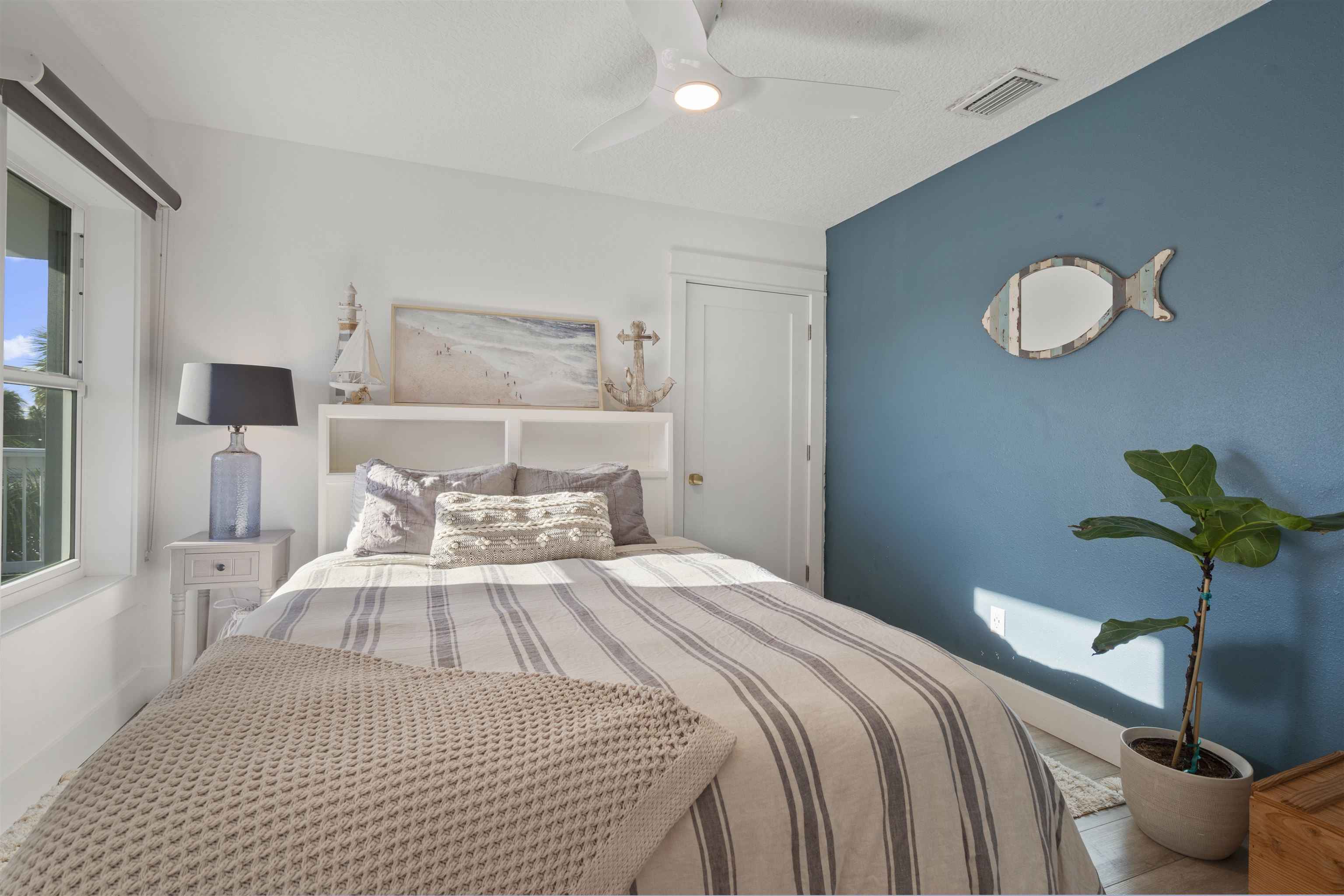 5730 Rudolph Avenue St. Augustine, FL 32080 - Photo 24 of 72 a bedroom with a bed and window