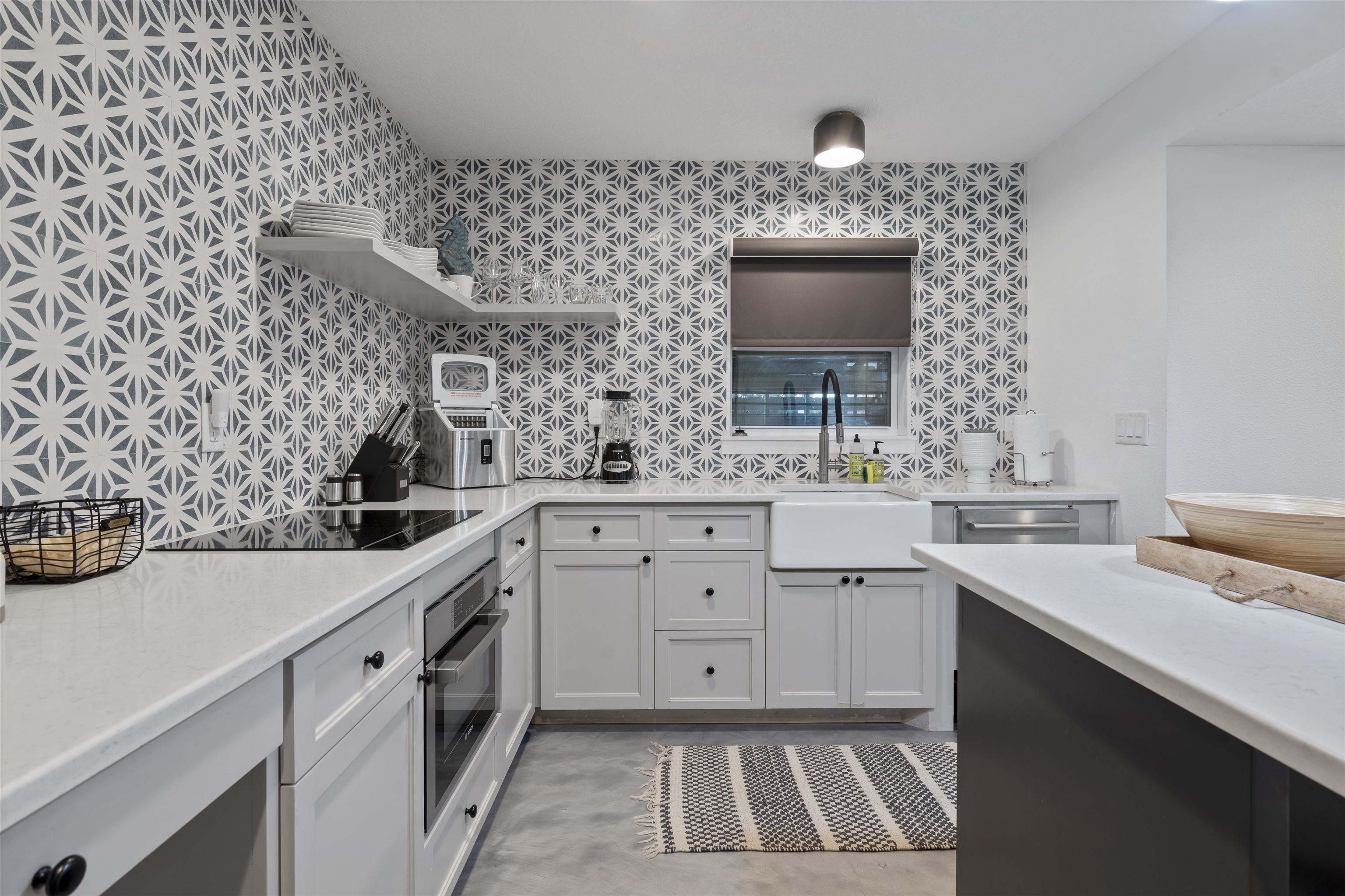 5730 Rudolph Avenue St. Augustine, FL 32080 - Photo 39 of 72 a spacious bathroom with a sink and a mirror