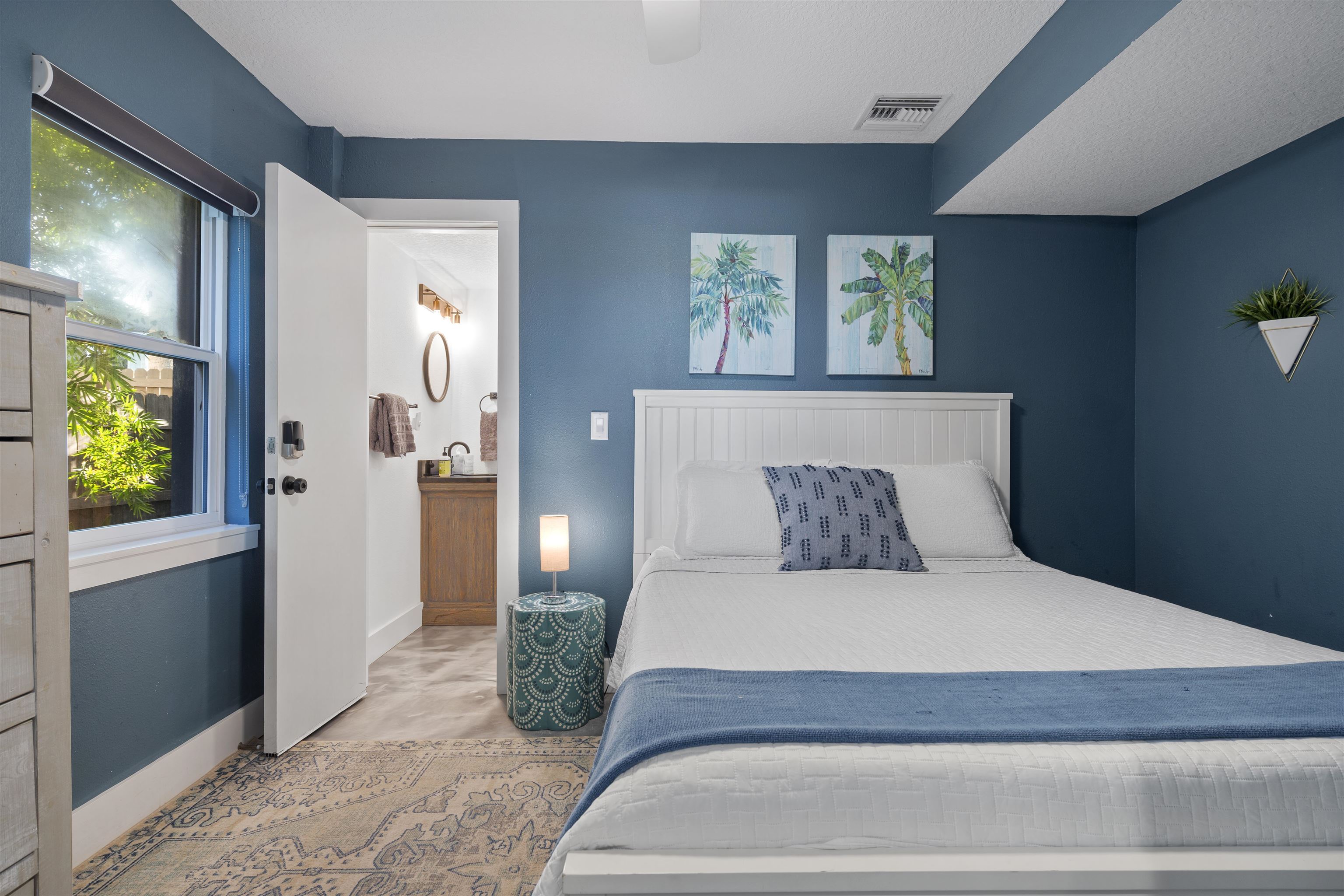 5730 Rudolph Avenue St. Augustine, FL 32080 - Photo 43 of 72 a large bed sitting in a bedroom next to a window