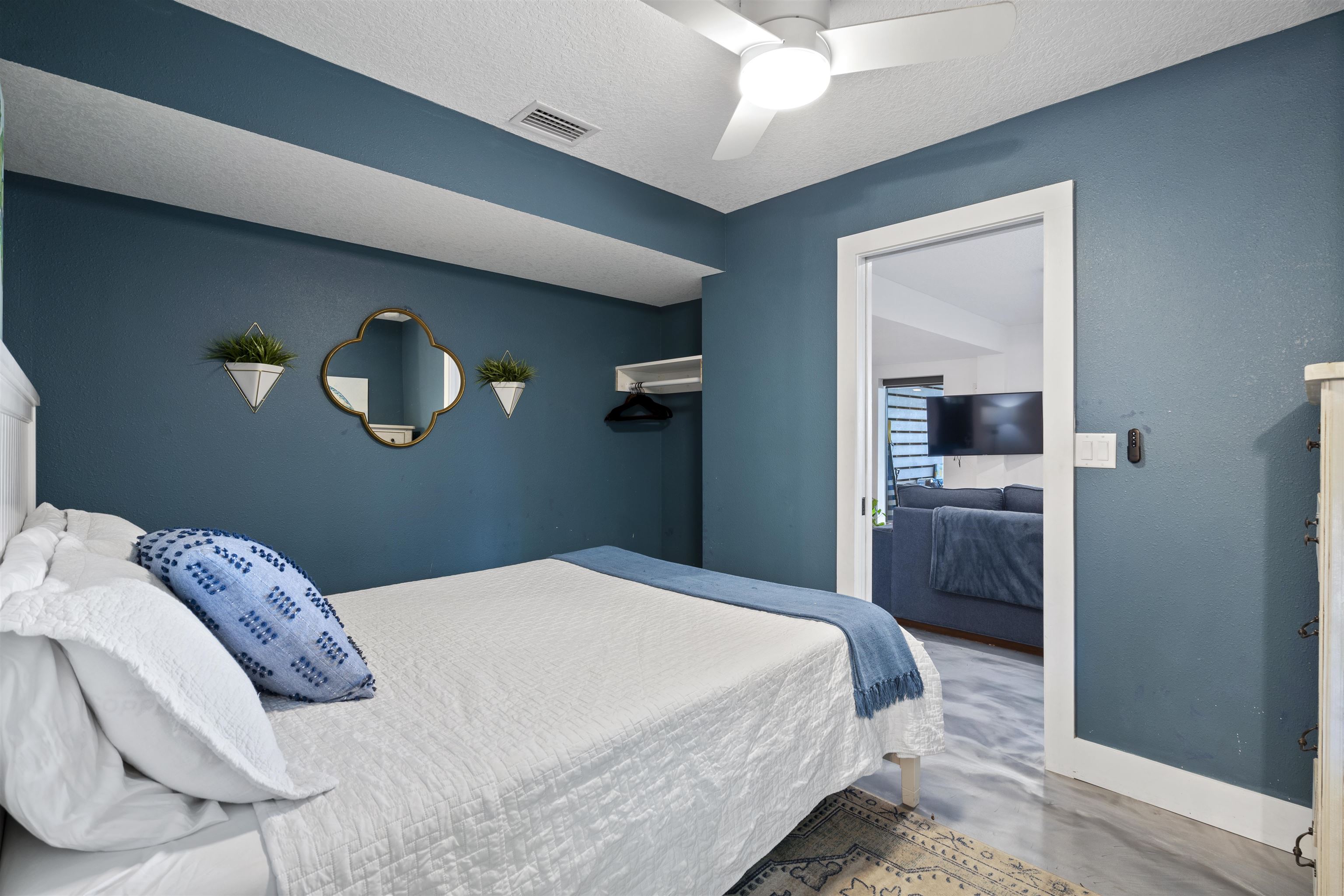 5730 Rudolph Avenue St. Augustine, FL 32080 - Photo 44 of 72 a bedroom with a bed and a view of bathroom