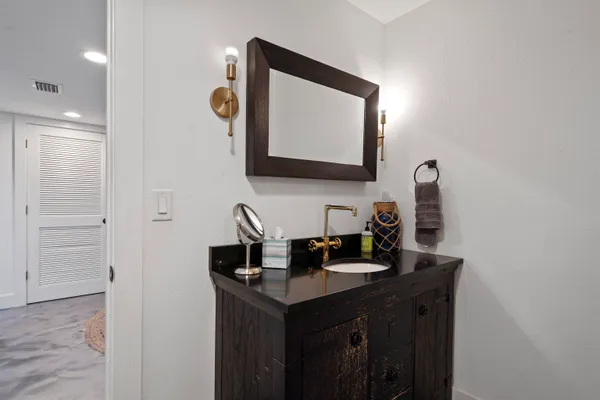 an aerial view of a house with a swimming pool