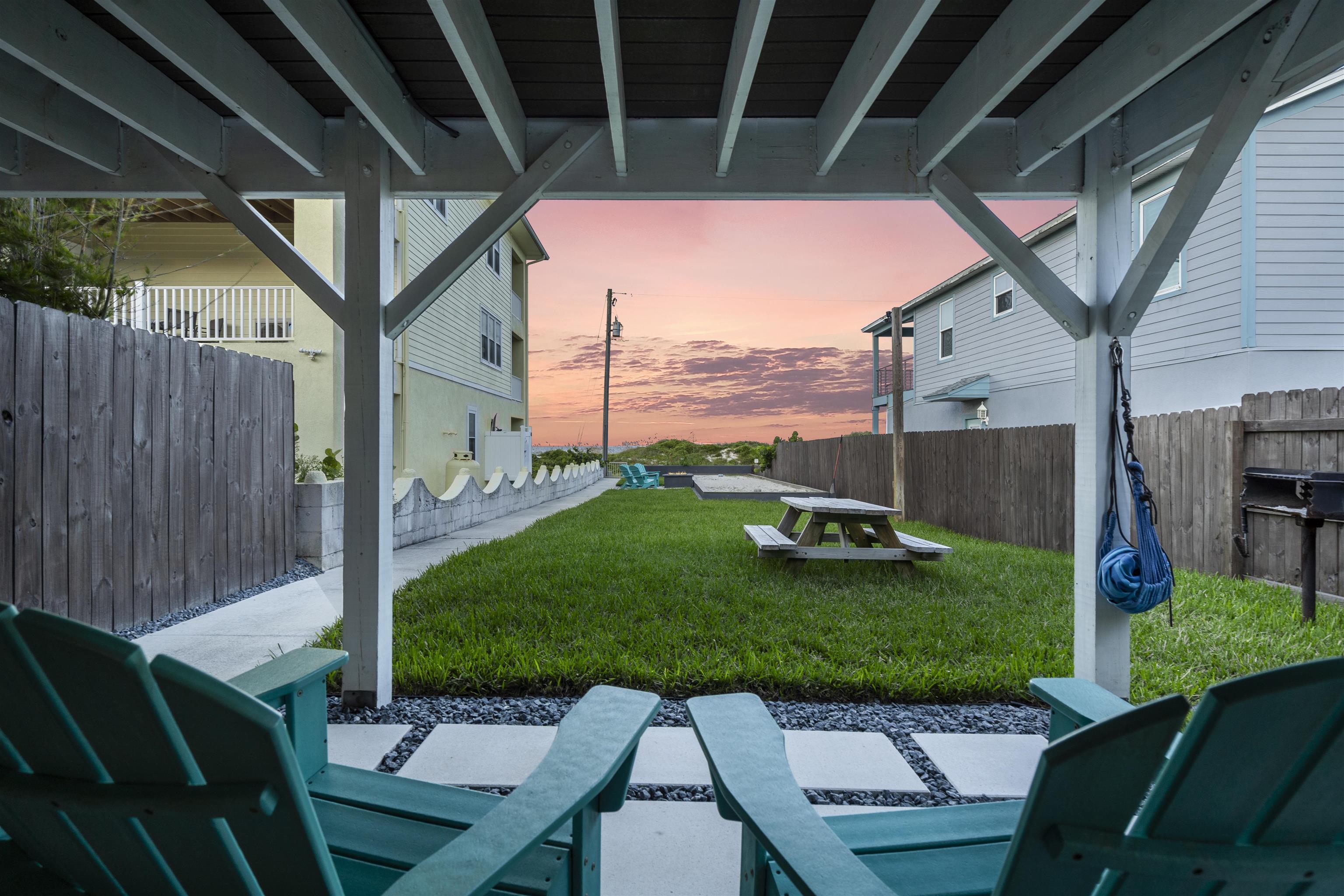 5730 Rudolph Avenue St. Augustine, FL 32080 - Photo 53 of 72 a view of a porch with furniture and garden