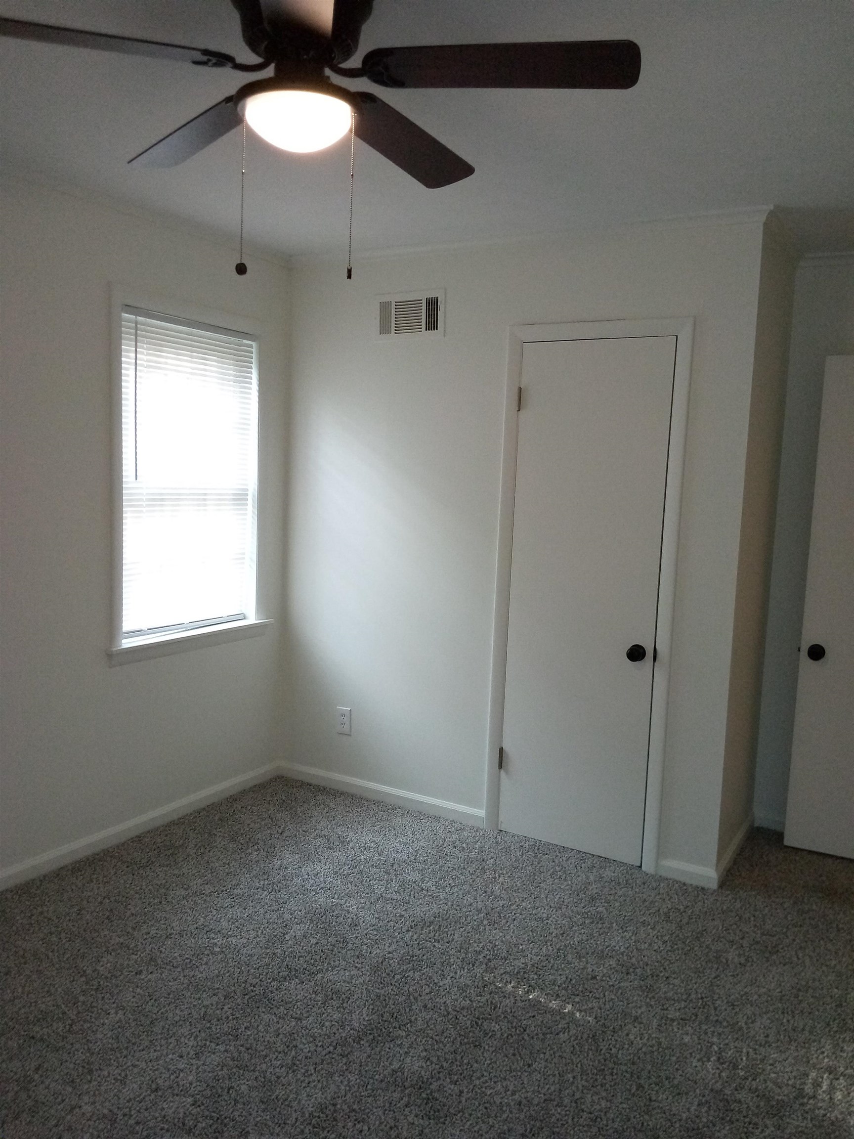 4425 Hodge Road Memphis, TN 38109 - Photo 26 of 37 a view of an empty room with a window
