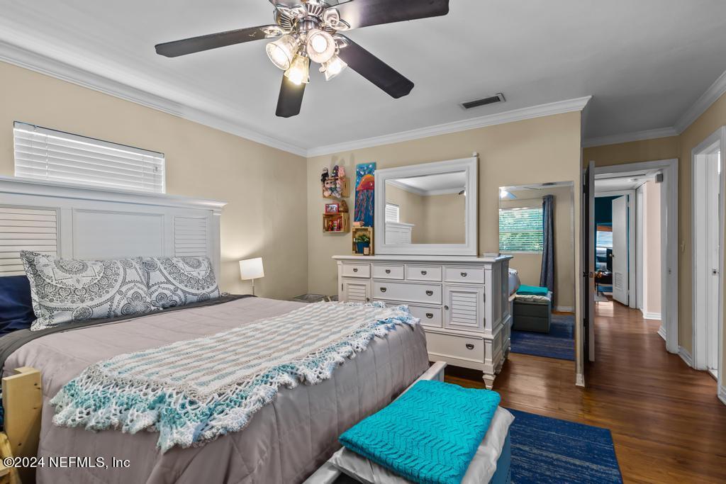 3645 Marianna Road Jacksonville, FL 32217 - Photo 18 of 44 a bedroom with a bed and a mirror on the dresser