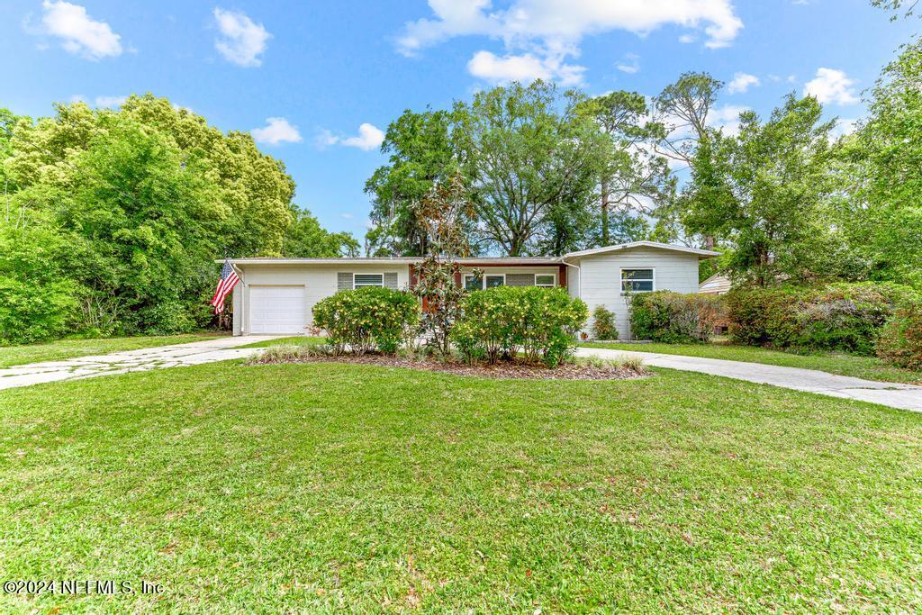 3645 Marianna Road Jacksonville, FL 32217 - Photo 2 of 44 a house view with a garden space