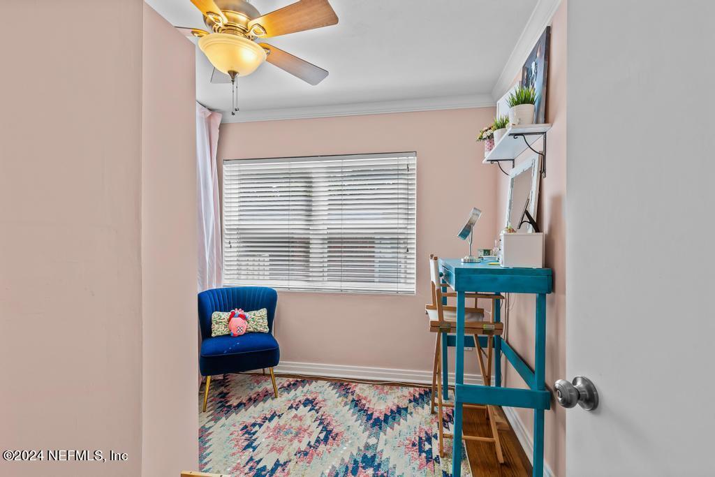 3645 Marianna Road Jacksonville, FL 32217 - Photo 25 of 44 a bedroom with a bed and a window