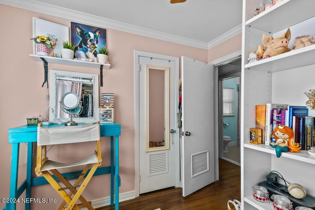 3645 Marianna Road Jacksonville, FL 32217 - Photo 27 of 44 a view of a workspace with furniture and wooden floor