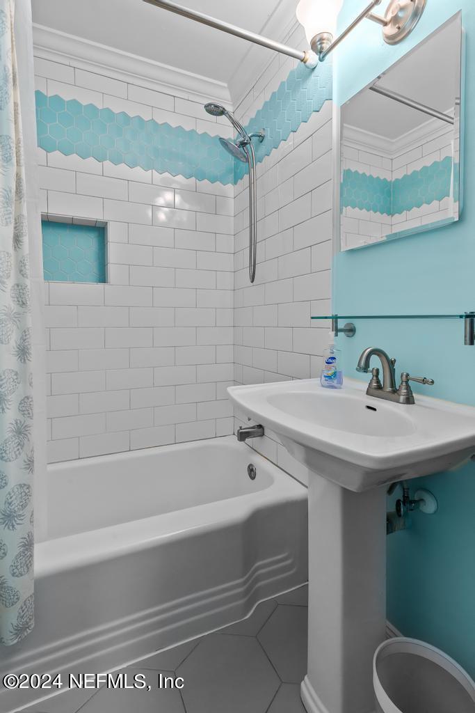 3645 Marianna Road Jacksonville, FL 32217 - Photo 29 of 44 a bathroom with a sink and mirror