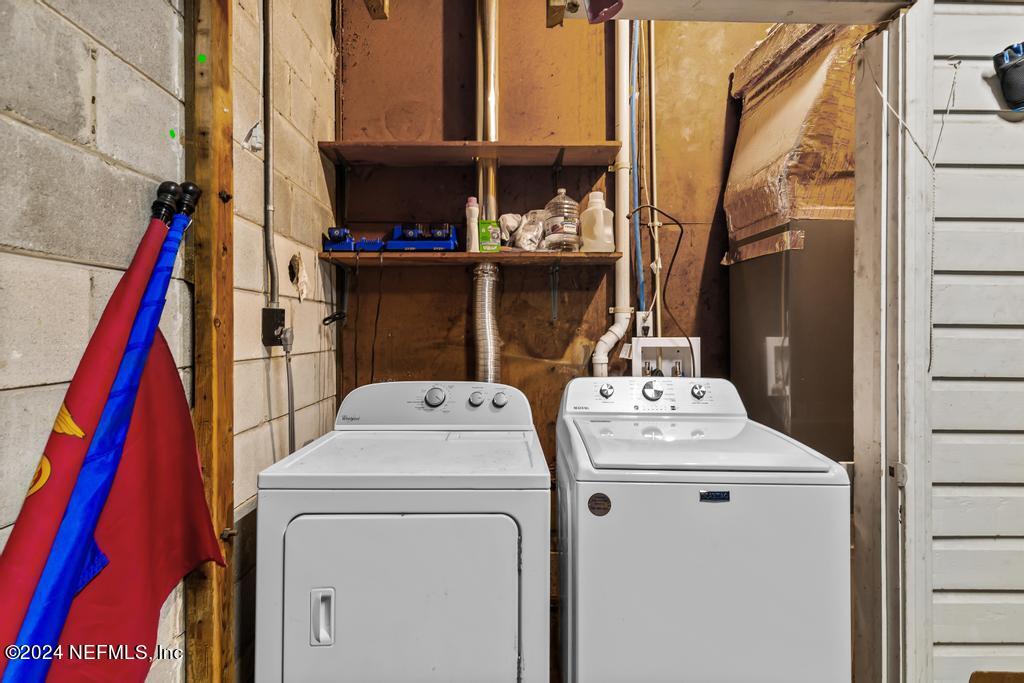 3645 Marianna Road Jacksonville, FL 32217 - Photo 32 of 44 a utility room with dryer and washer