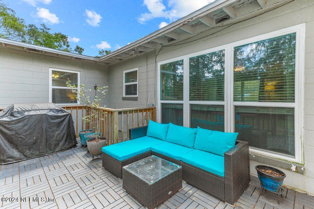 3645 Marianna Road Jacksonville, FL 32217 - Photo 34 of 44 a backyard of a house with seating space