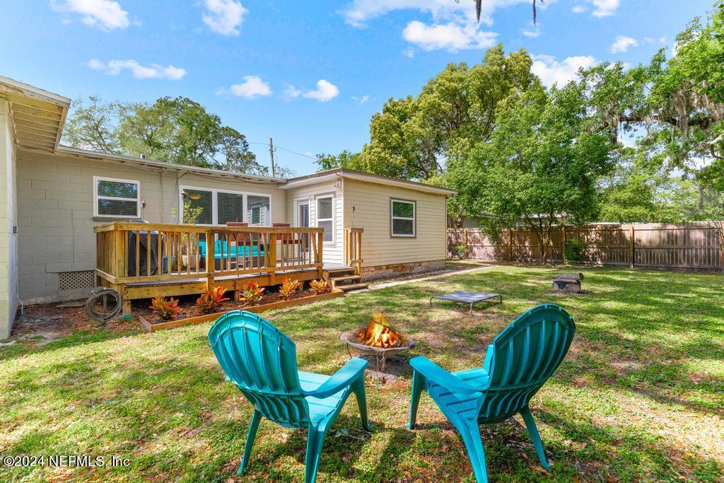 3645 Marianna Road Jacksonville, FL 32217 - Photo 36 of 44 a view of a house with backyard and sitting area