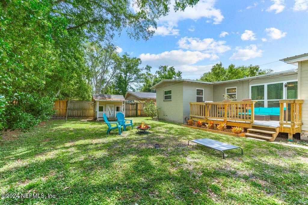 3645 Marianna Road Jacksonville, FL 32217 - Photo 37 of 44 a view of a house with backyard sitting area and garden