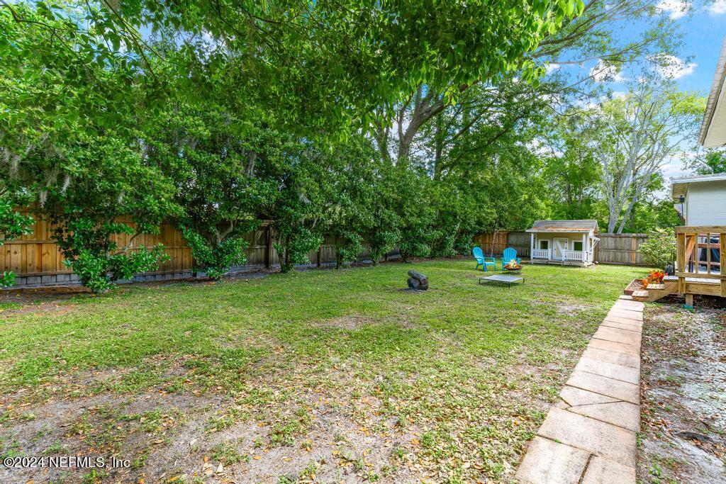 3645 Marianna Road Jacksonville, FL 32217 - Photo 40 of 44 a view of a backyard with a garden