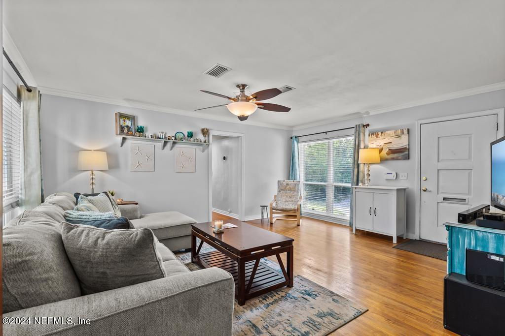 3645 Marianna Road Jacksonville, FL 32217 - Photo 5 of 44 a living room with furniture and wooden floor