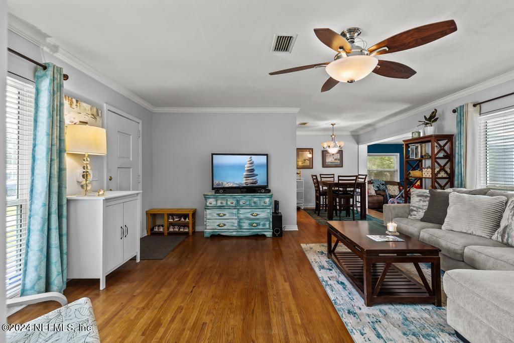 3645 Marianna Road Jacksonville, FL 32217 - Photo 6 of 44 a living room with furniture and a wooden floor