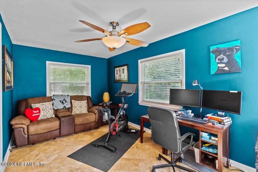 3645 Marianna Road Jacksonville, FL 32217 - Photo 8 of 44 a living room with furniture workspace and a window