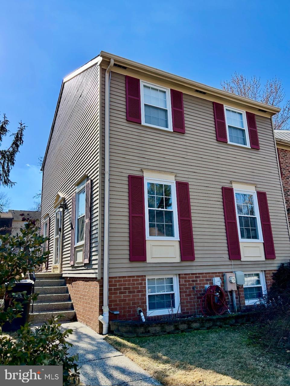 1007 Cape Splitt Harbour Pasadena, MD 21122 - Photo 1 of 19 a front view of a house with garden