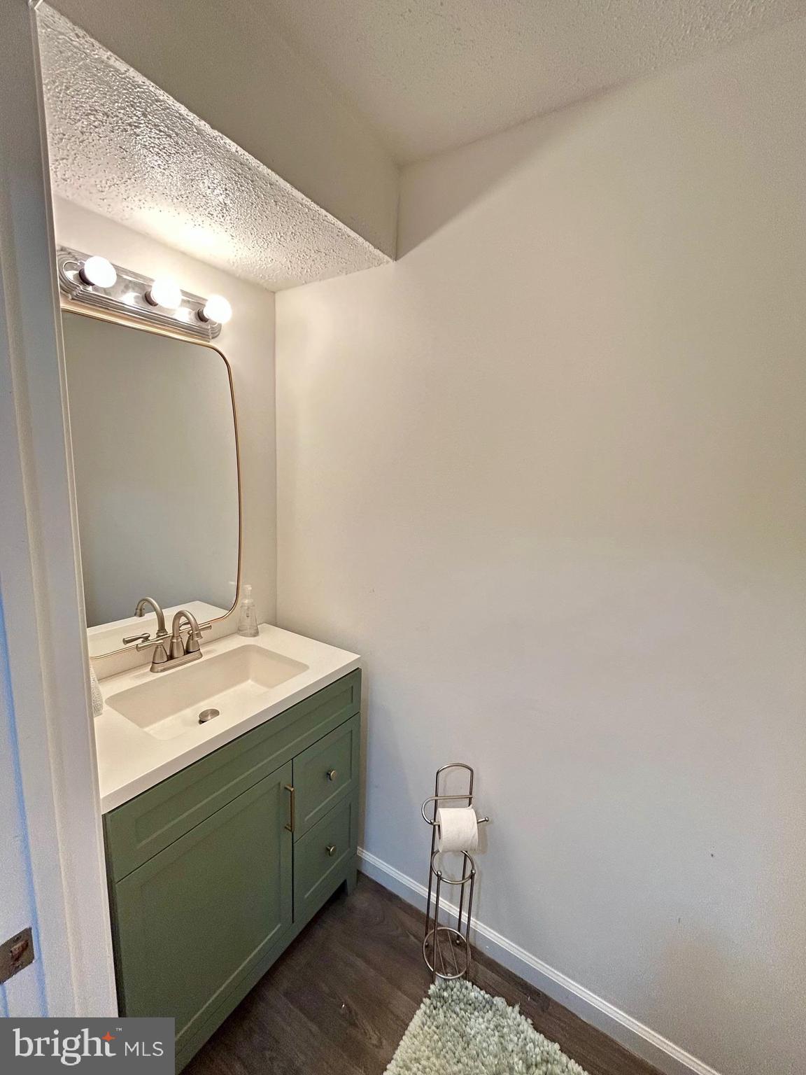 1007 Cape Splitt Harbour Pasadena, MD 21122 - Photo 15 of 19 a bathroom with a sink and a mirror