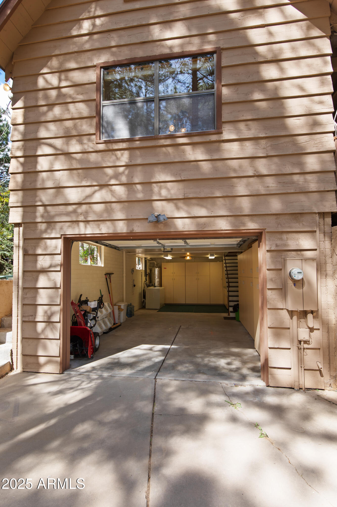 3910 Larson Loop Forest Lakes, AZ 85931 - Photo 13 of 57 Basement garage under house