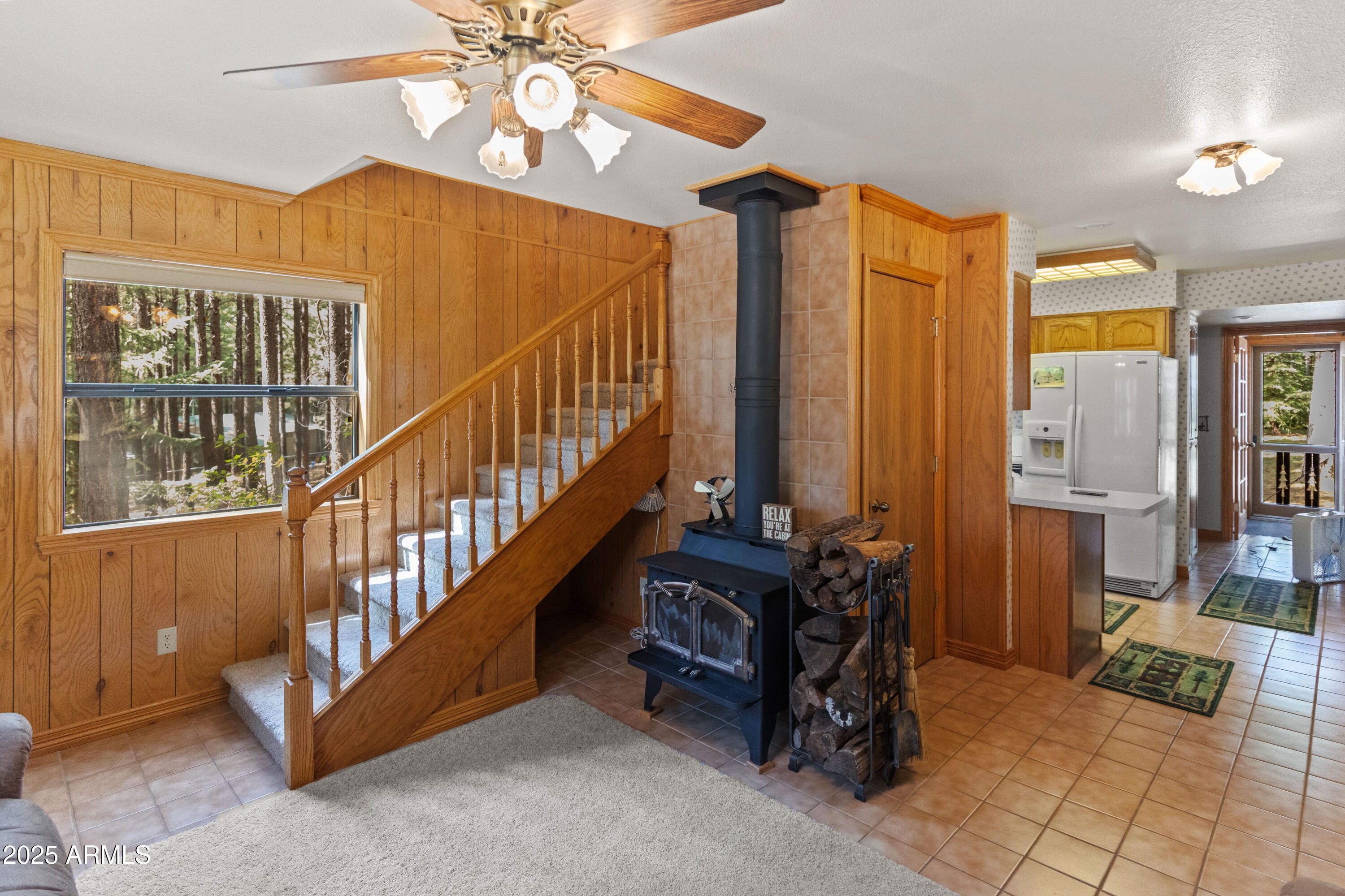 3910 Larson Loop Forest Lakes, AZ 85931 - Photo 29 of 57 Living room, stairs up