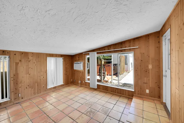 a view of an empty room and window