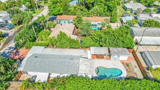 an aerial view of a house with a garden