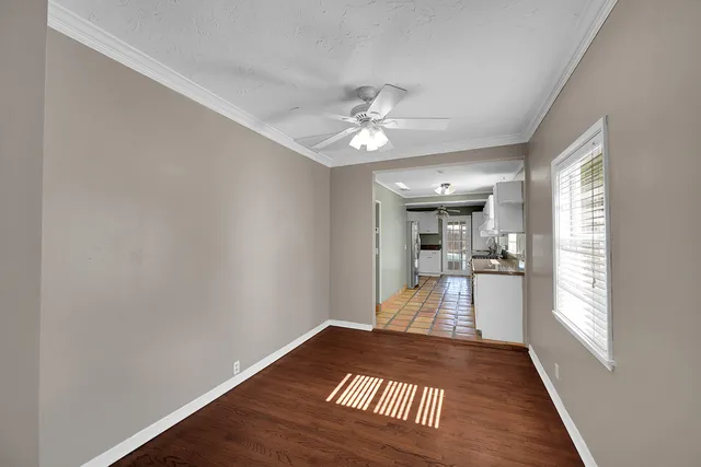 a view of a living room and hardwood floor