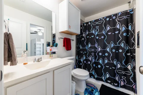 a view of livingroom with furniture and toys