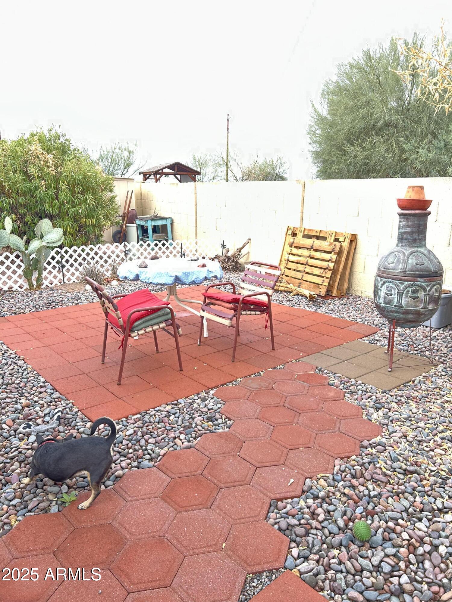 10220 East Apache Trail, Unit 13 Apache Junction, AZ 85120 - Photo 16 of 22 Outdoor Patio w/Chimania