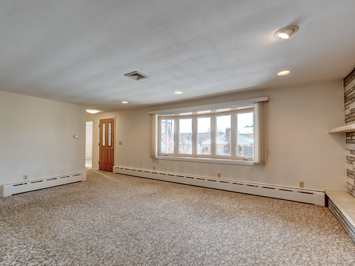 10 McKay Street Torrington, CT 06790 - Photo 16 of 39 a view of an empty room with a window