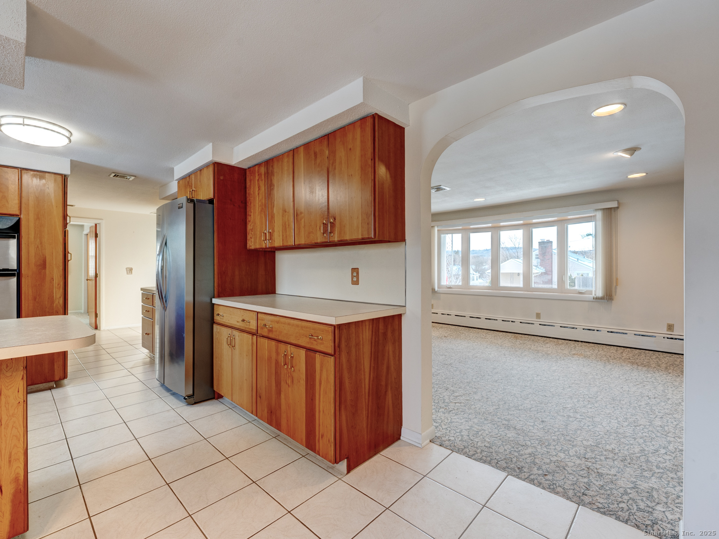 10 McKay Street Torrington, CT 06790 - Photo 19 of 39 a kitchen with stainless steel appliances granite countertop a refrigerator and a sink