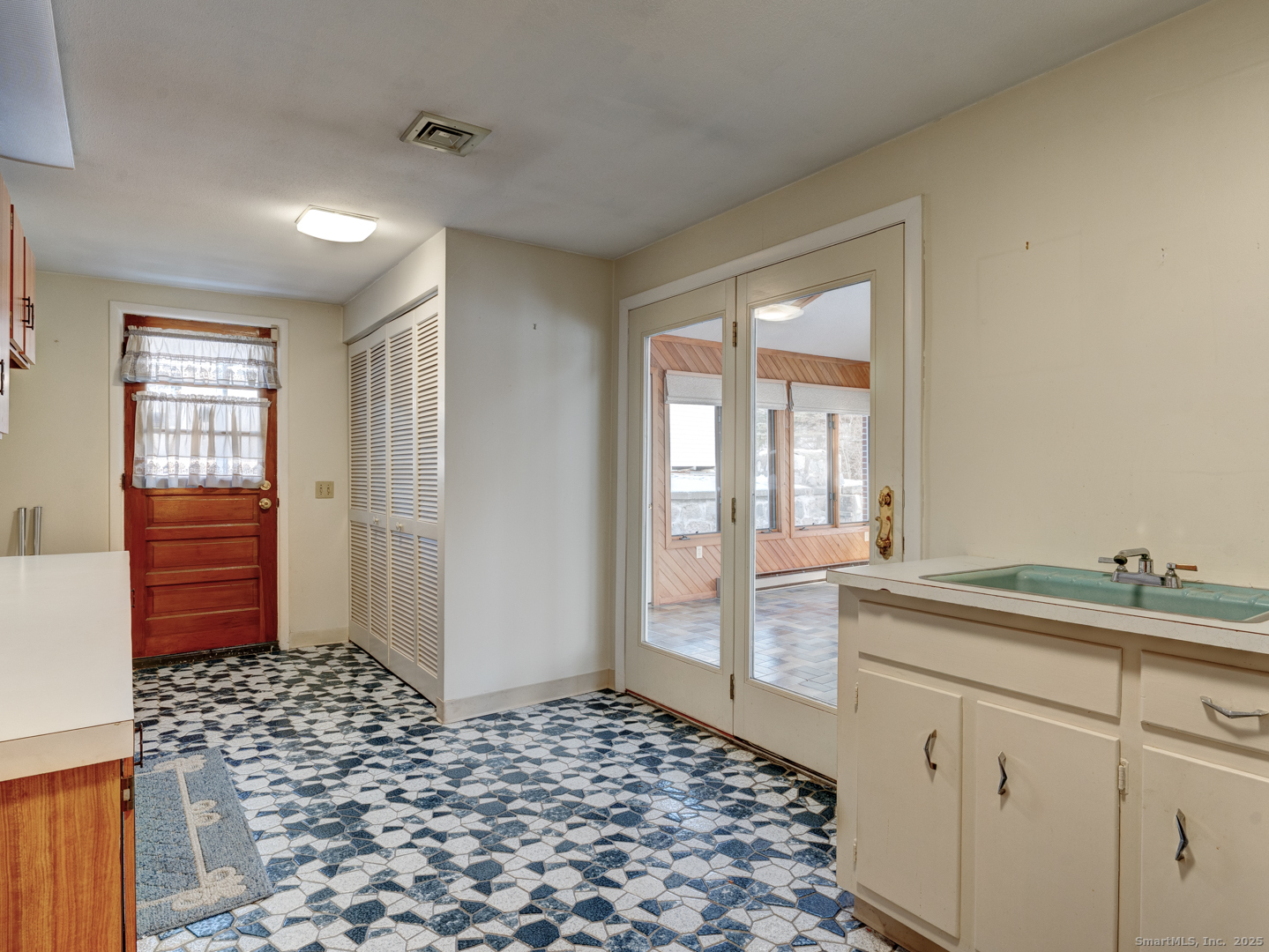 10 McKay Street Torrington, CT 06790 - Photo 23 of 39 a bathroom with a sink and a mirror
